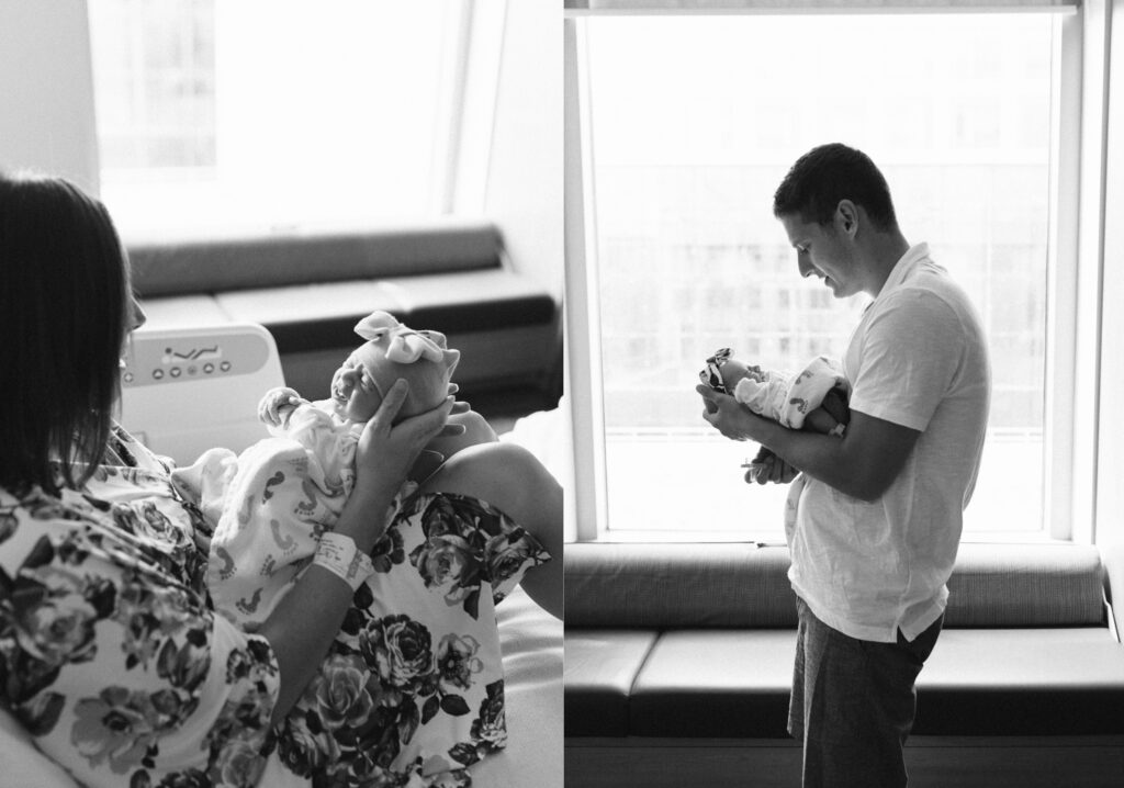 Mom and dad snuggle their firstborn in hospital room.