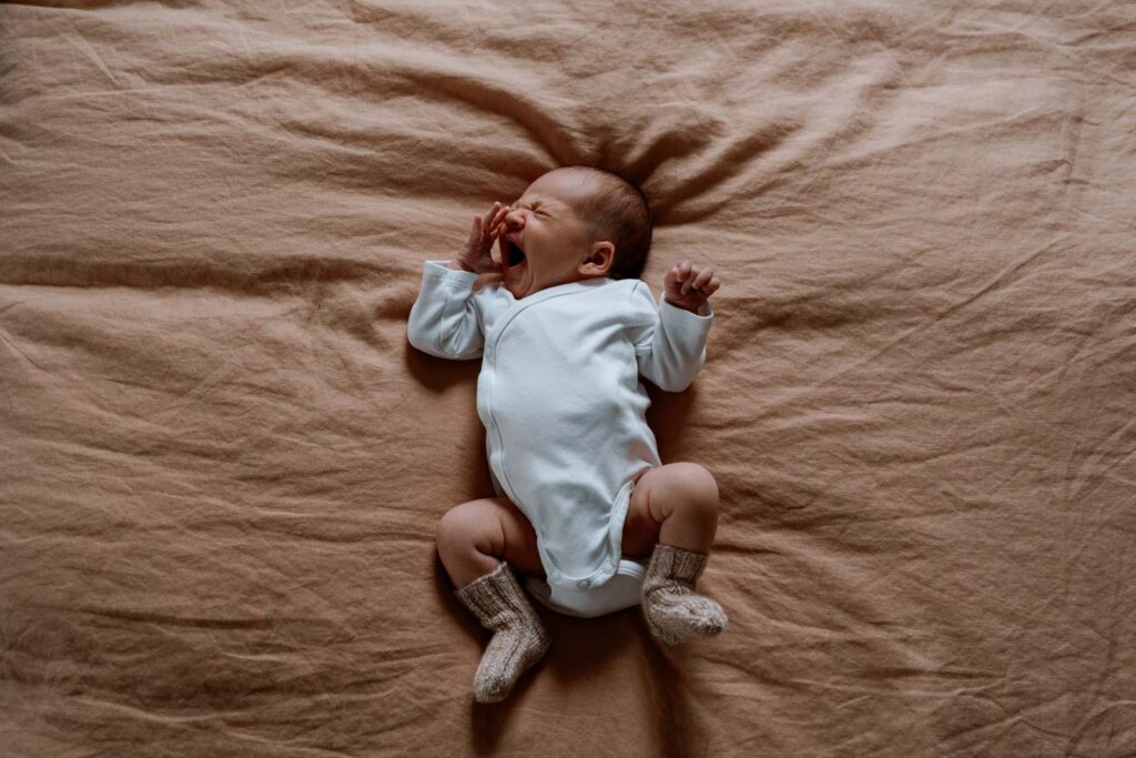 newborn baby yawning